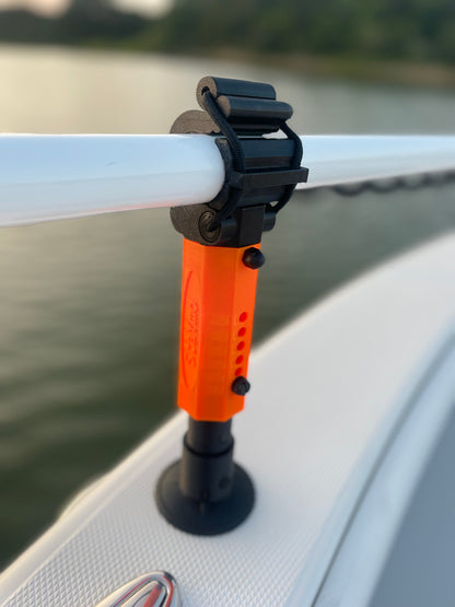 Ultra Orange Staymo trolling motor stabilizer attached to the boat deck with a sunset background